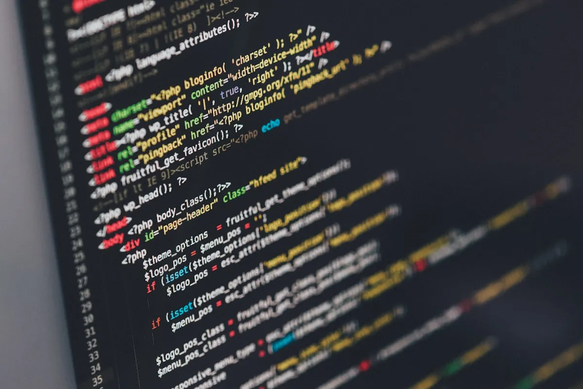 Code on a monitor in a dark room